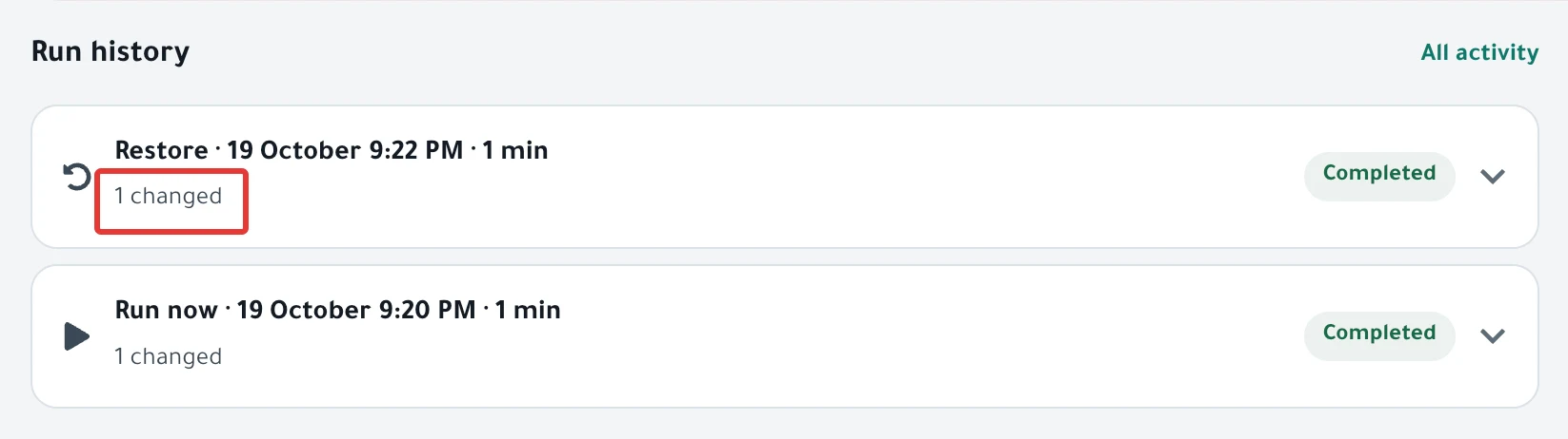 The Run history section on a schedule page: an On Schedule run and a Restore run, with their counts and statuses.